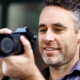 male-photographer-taking-picture-PQ3PLLL-Custom.jpg